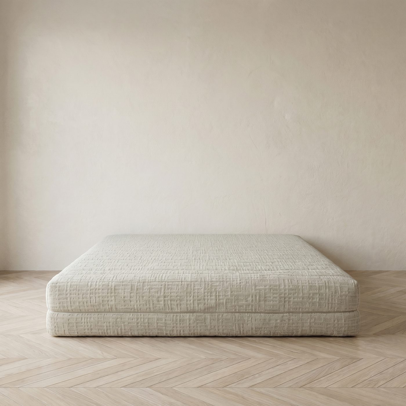 A mattress in a textured woven cover